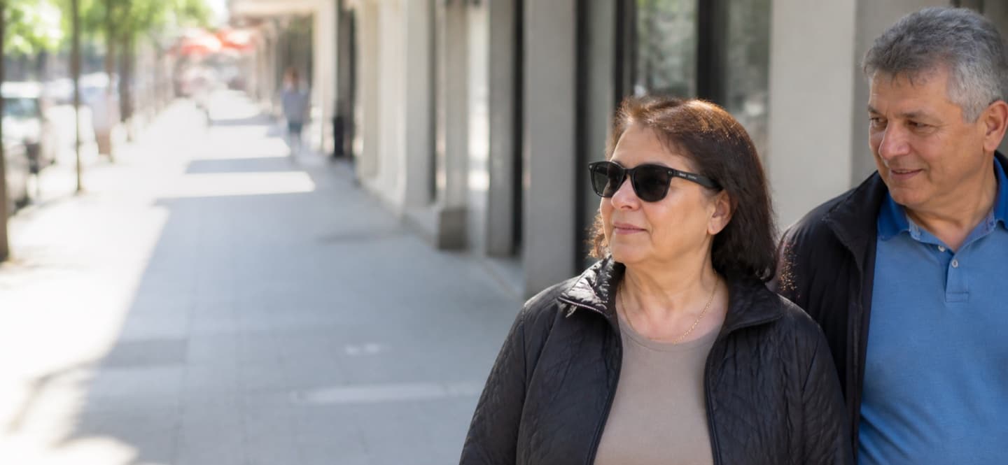 A SparkVision user wearing assistive glasses in daily life